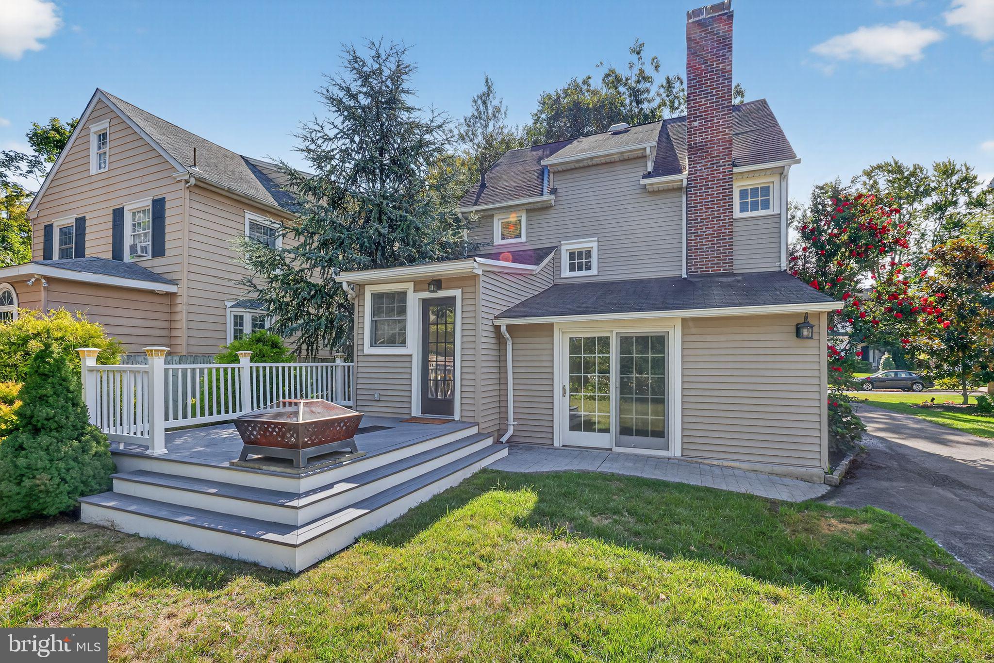 159 Wayne Avenue Haddonfield, NJ 08033 - Photo 29 of 30 a front view of a house with a garden