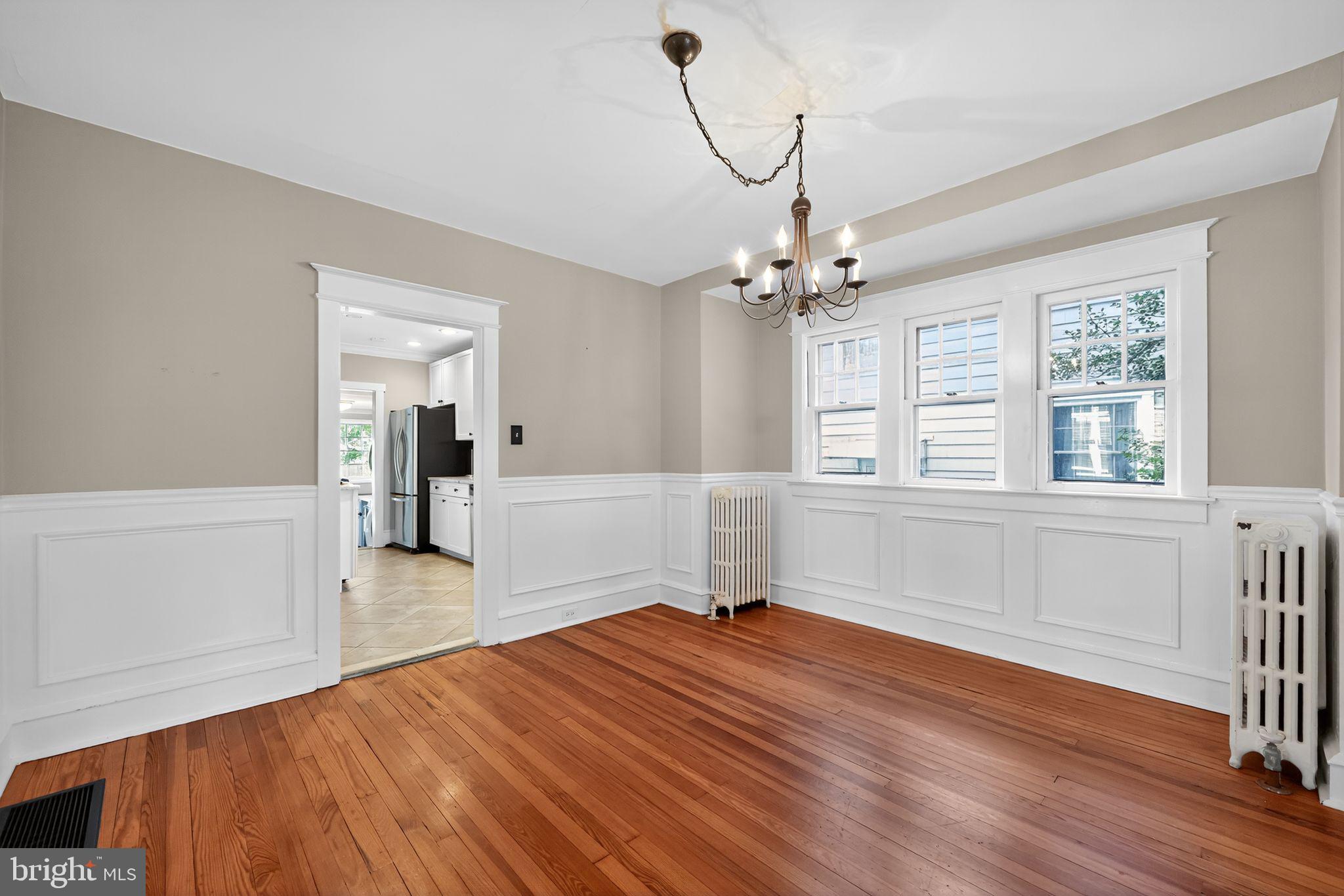 159 Wayne Avenue Haddonfield, NJ 08033 - Photo 7 of 30 a view of a room with wooden floor and windows