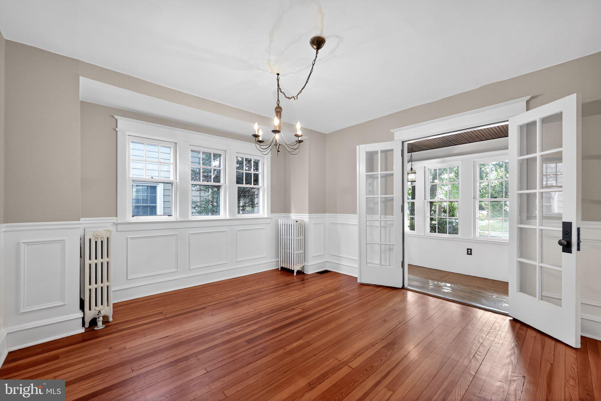 159 Wayne Avenue Haddonfield, NJ 08033 - Photo 10 of 30 a view of empty room with wooden floor and fan