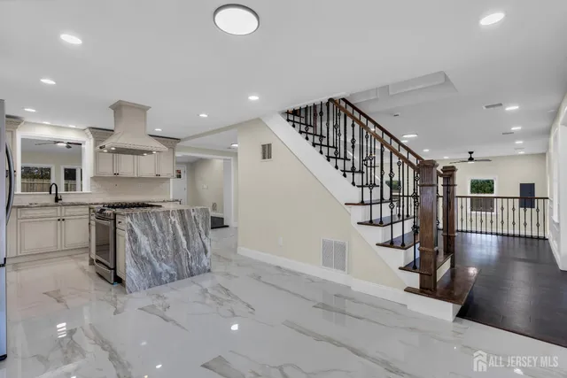 a view of a livingroom with wooden floor