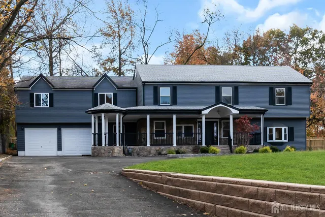 a view of a house with a big yard