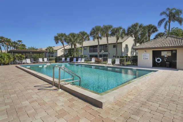 a view of a house with a swimming pool