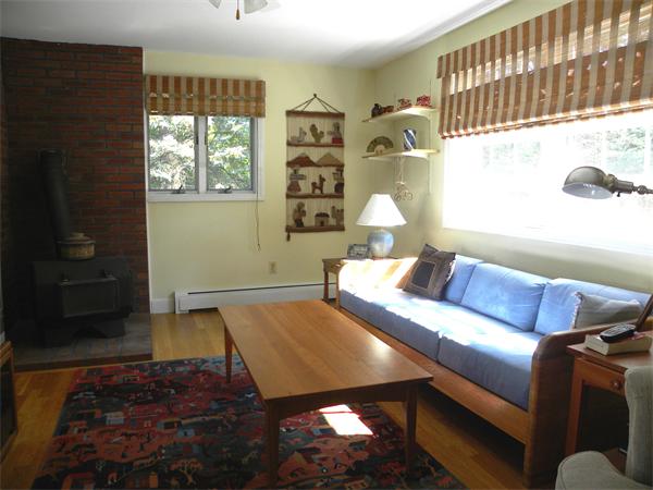 63 High Plain Road Andover, MA 01810 - Photo 12 of 15 a living room with furniture and a window