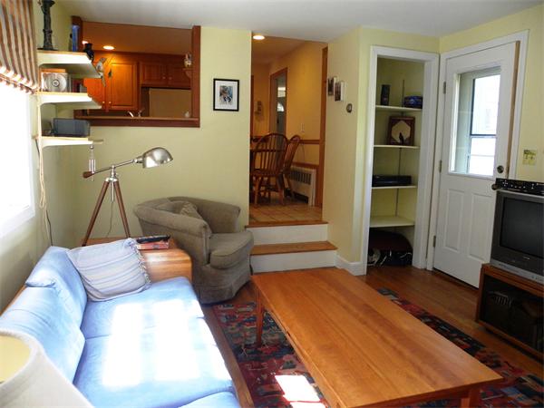 63 High Plain Road Andover, MA 01810 - Photo 13 of 15 a living room with furniture and a flat screen tv