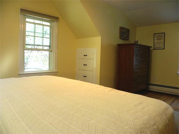 63 High Plain Road Andover, MA 01810 - Photo 15 of 15 a bedroom with a bed and a window