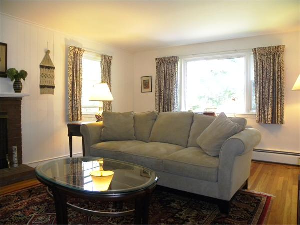 63 High Plain Road Andover, MA 01810 - Photo 10 of 15 a living room with furniture and a window