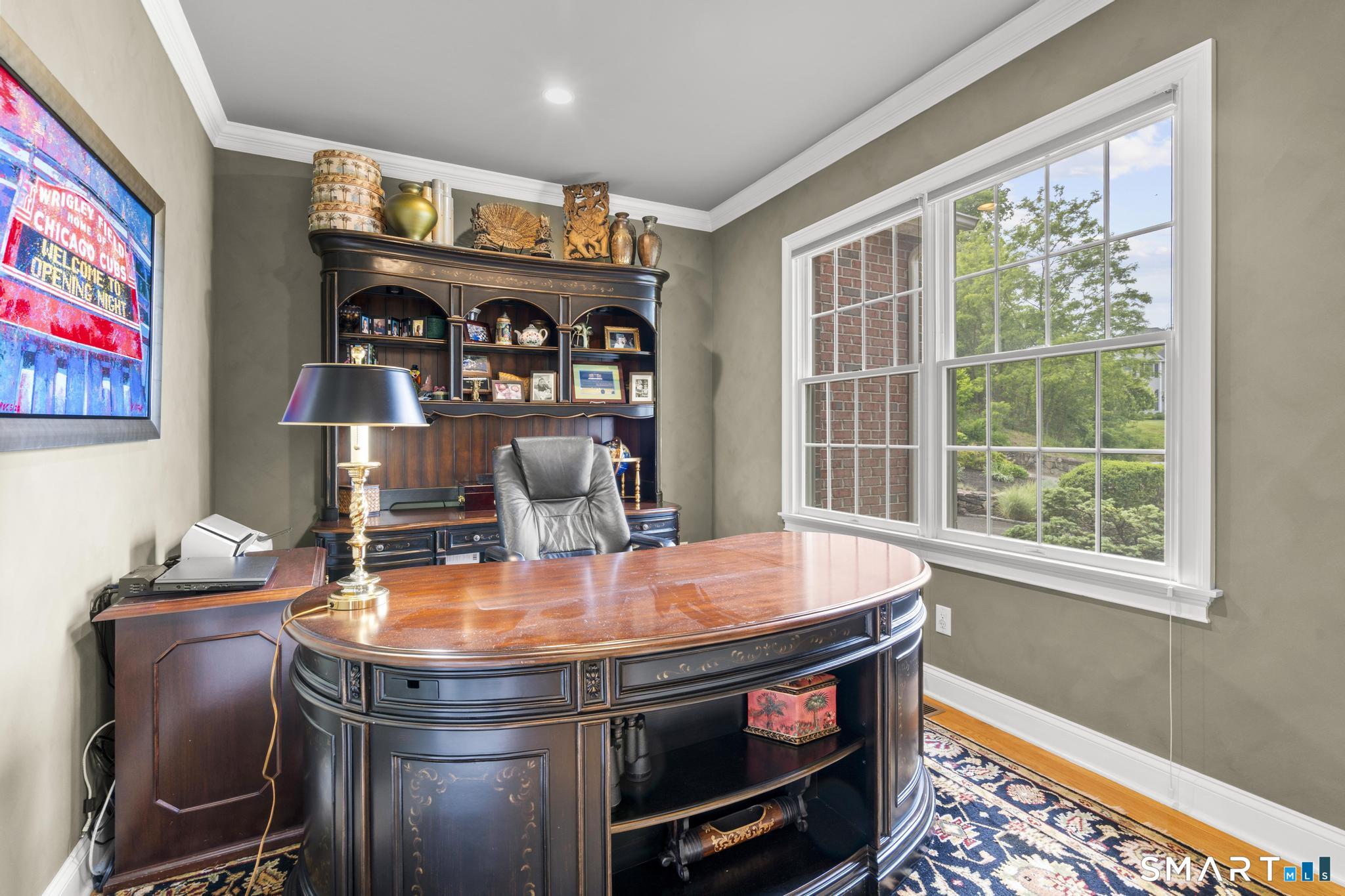 12 Logans Way Danbury, CT 06811 - Photo 12 of 40 a room with furniture and window