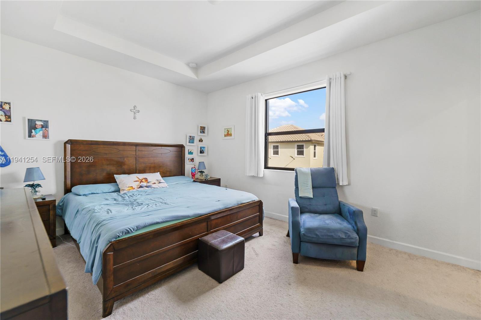 11805 Southwest 245 Terrace Homestead, FL 33032 - Photo 23 of 37 a bedroom with a bed and lamp