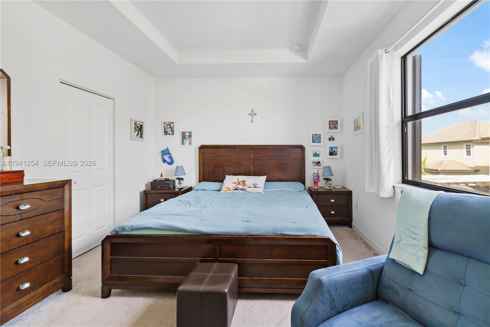 11805 Southwest 245 Terrace Homestead, FL 33032 - Photo 24 of 37 a bedroom with a bed and window