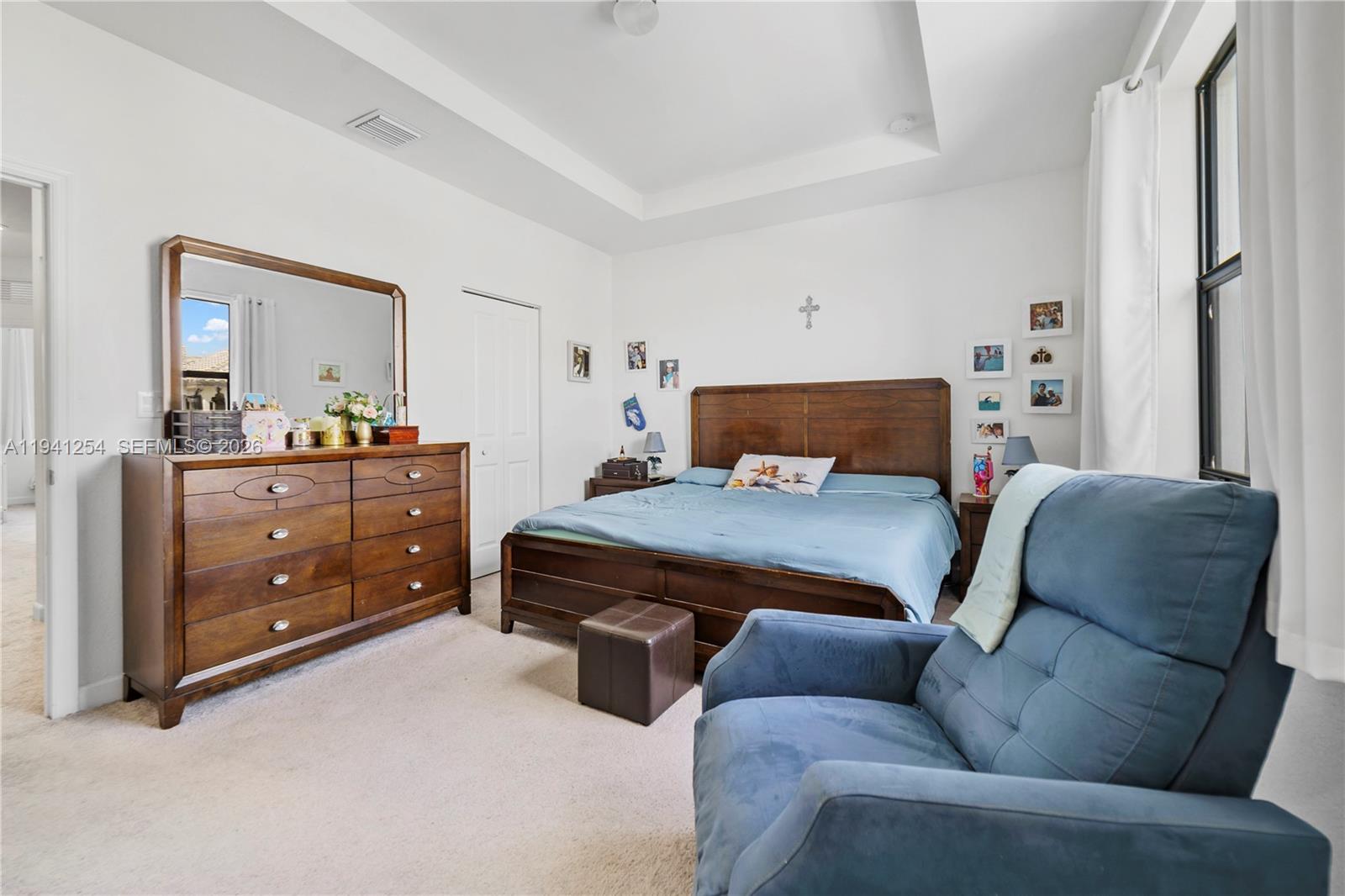 11805 Southwest 245 Terrace Homestead, FL 33032 - Photo 25 of 37 a bedroom with furniture and balcony