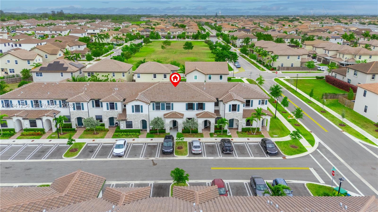 11805 Southwest 245 Terrace Homestead, FL 33032 - Photo 31 of 37 an aerial view of residential houses with swimming pool