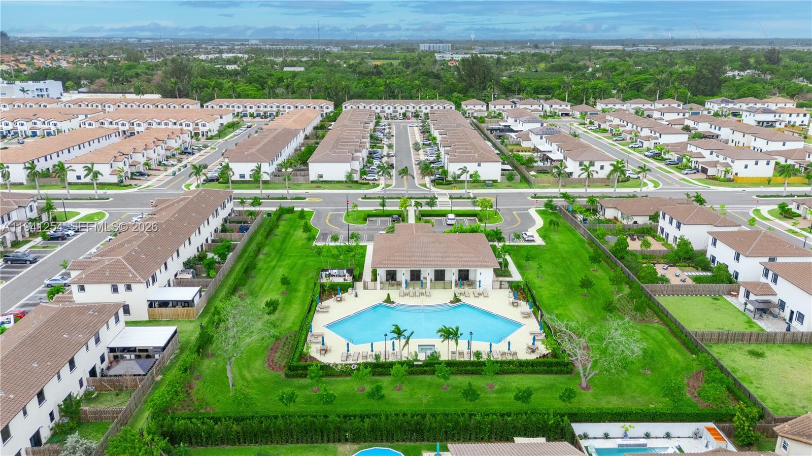 11805 Southwest 245 Terrace Homestead, FL 33032 - Photo 36 of 37 an aerial view of multiple houses with yard