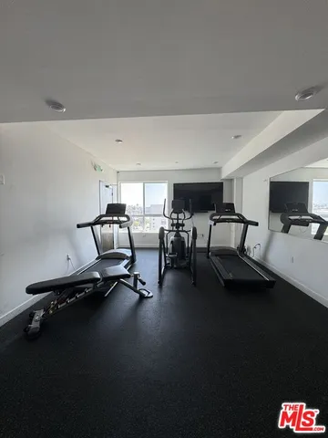 a view of a living room and entryway
