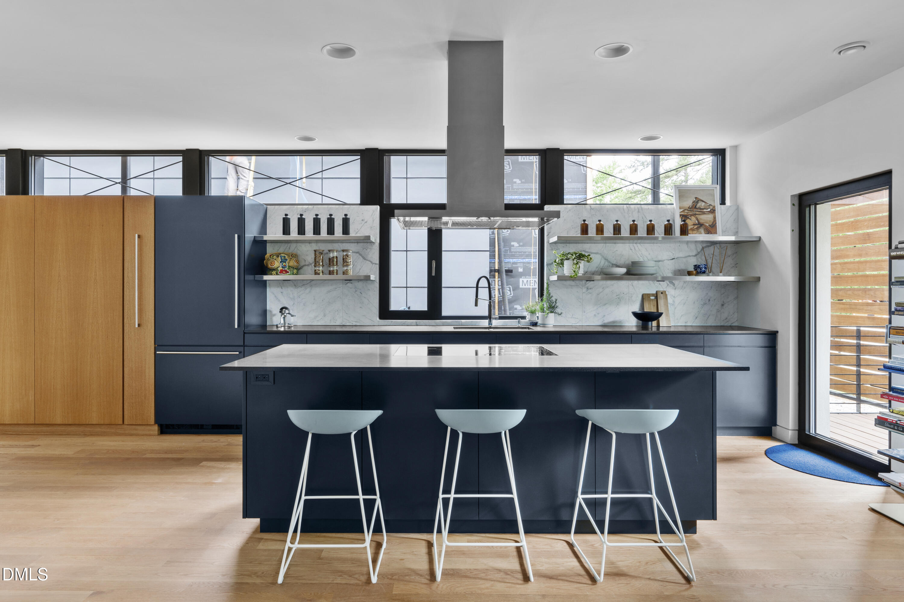 924 Tower Street Raleigh, NC 27607 - Photo 14 of 32 a kitchen with stainless steel appliances a sink and a refrigerator
