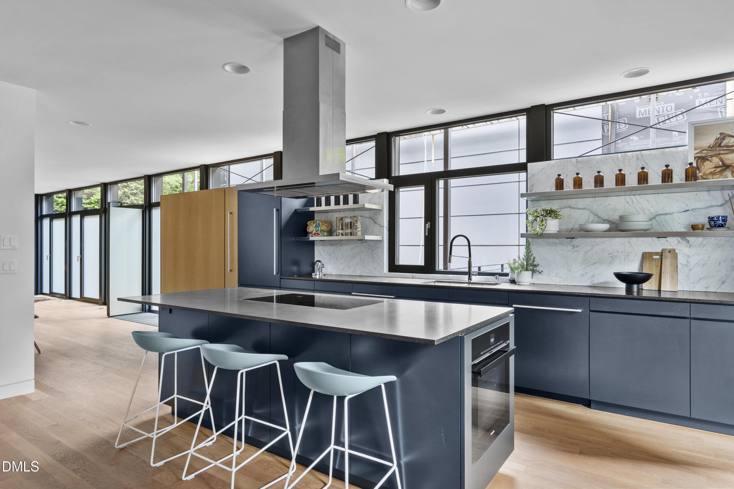 924 Tower Street Raleigh, NC 27607 - Photo 15 of 32 a kitchen with stainless steel appliances a sink and cabinets