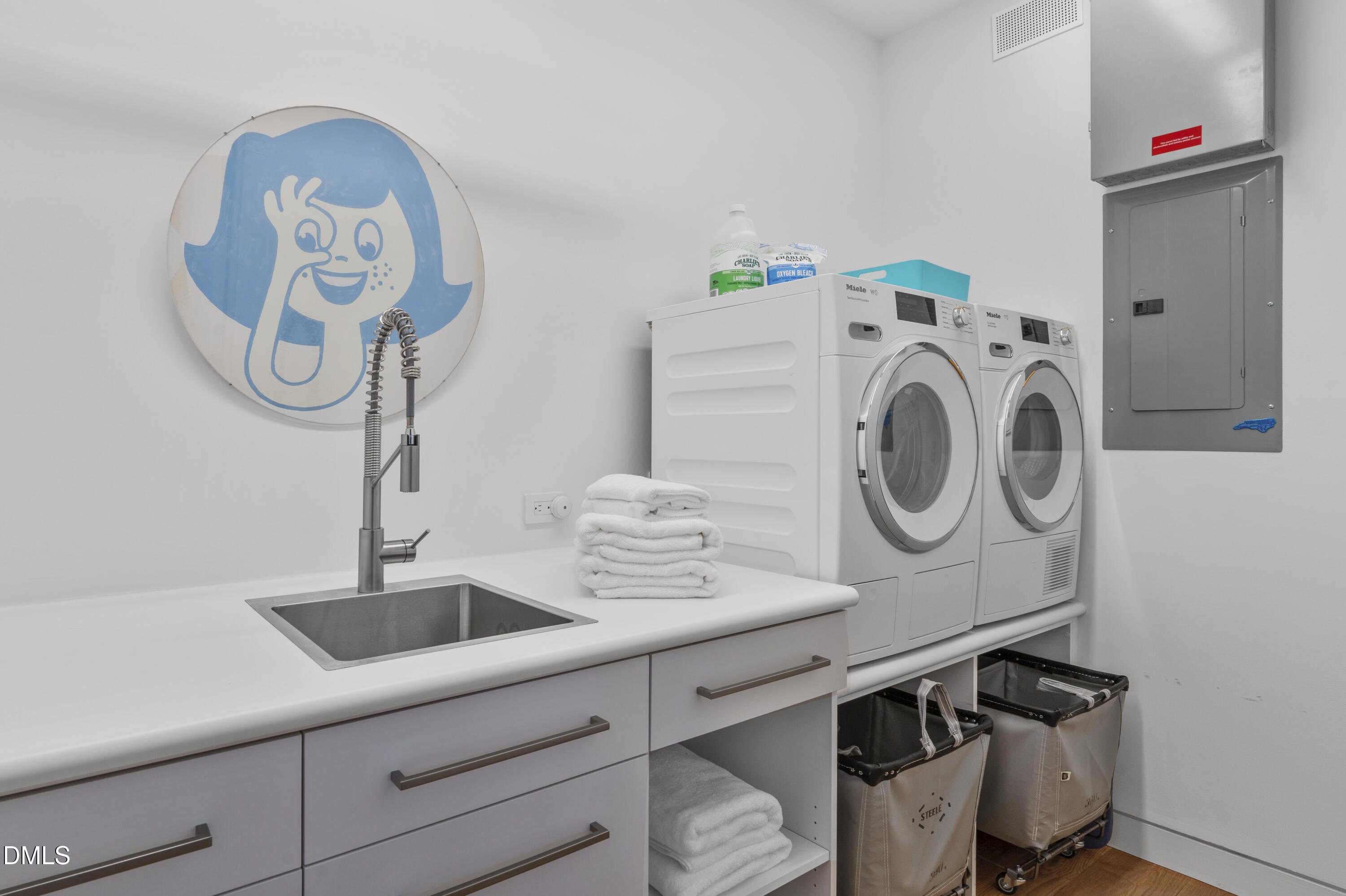 924 Tower Street Raleigh, NC 27607 - Photo 22 of 32 a utility room with dryer and washer