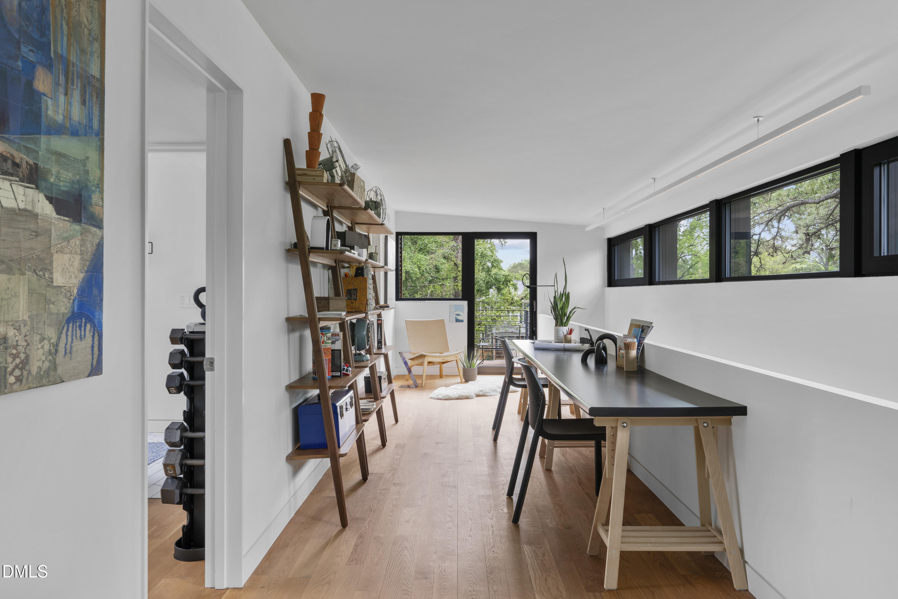 924 Tower Street Raleigh, NC 27607 - Photo 23 of 32 a view of a livingroom with furniture and workspace