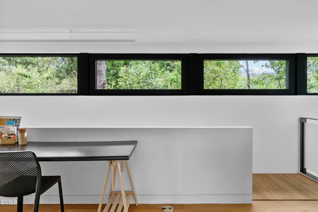 a view of a living room and window