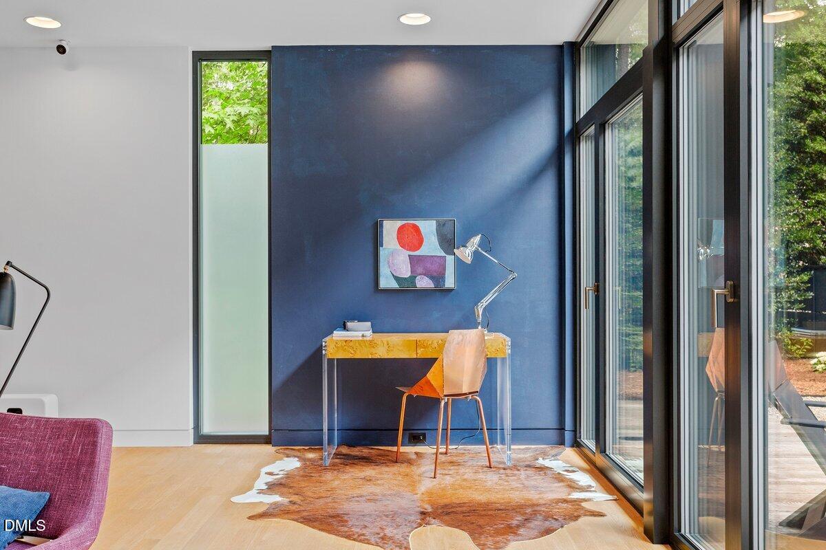 924 Tower Street Raleigh, NC 27607 - Photo 7 of 32 a view of an entryway with wooden floor