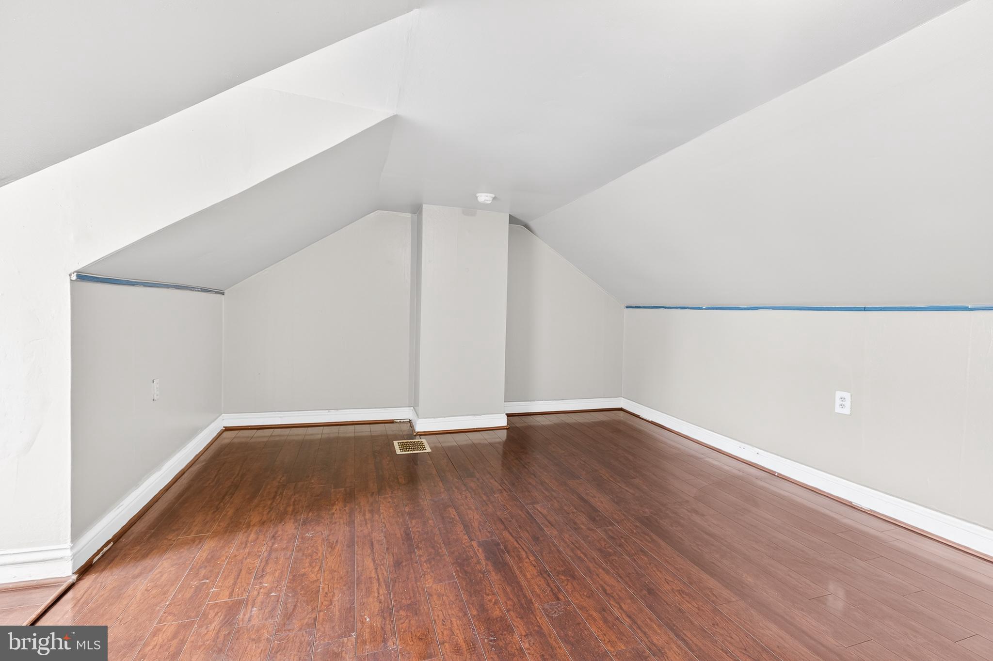 635 1st Street Lancaster, PA 17603 - Photo 21 of 32 a view of an empty room with wooden floor