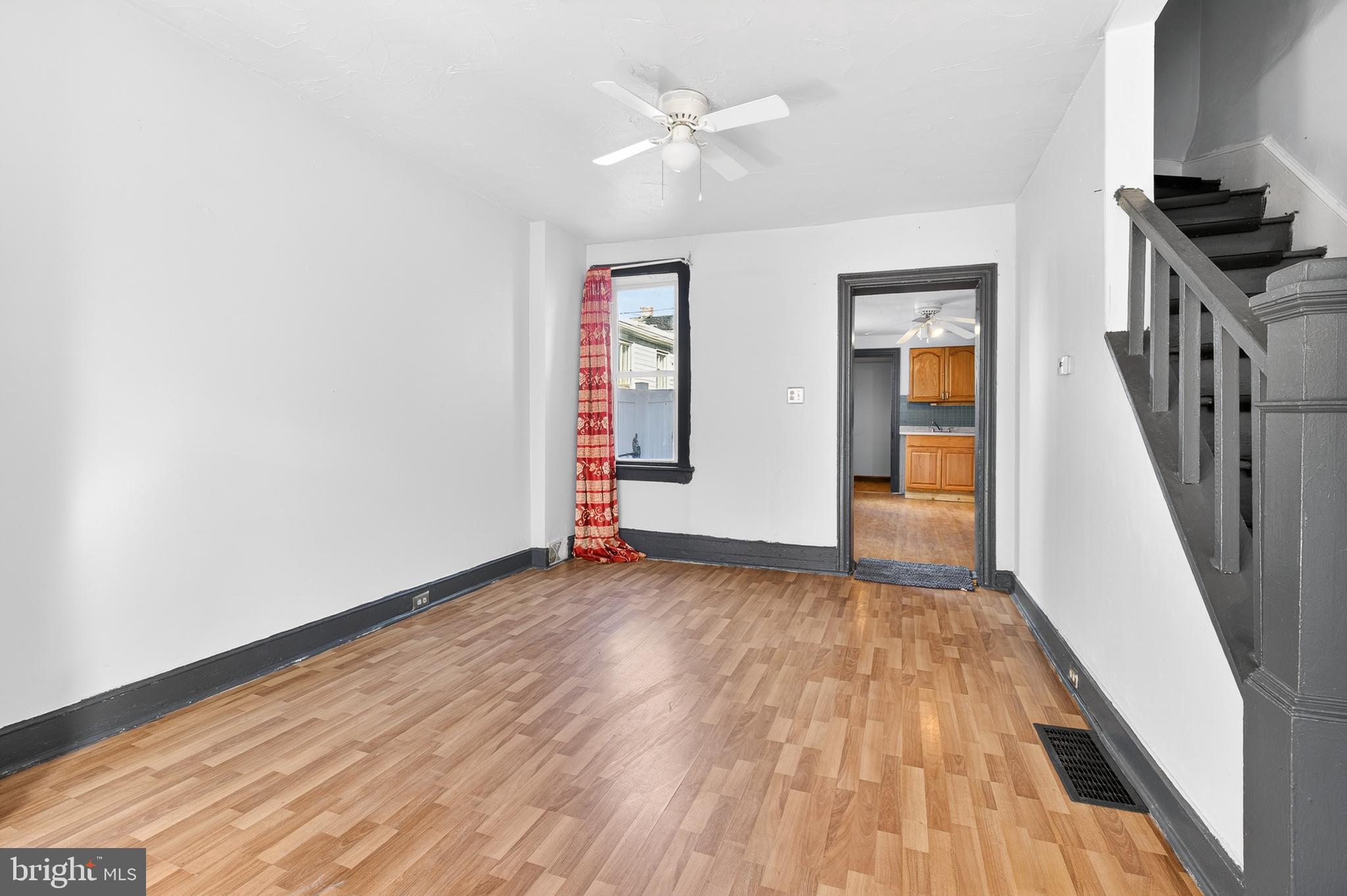 635 1st Street Lancaster, PA 17603 - Photo 3 of 32 wooden floor in an empty room with a window