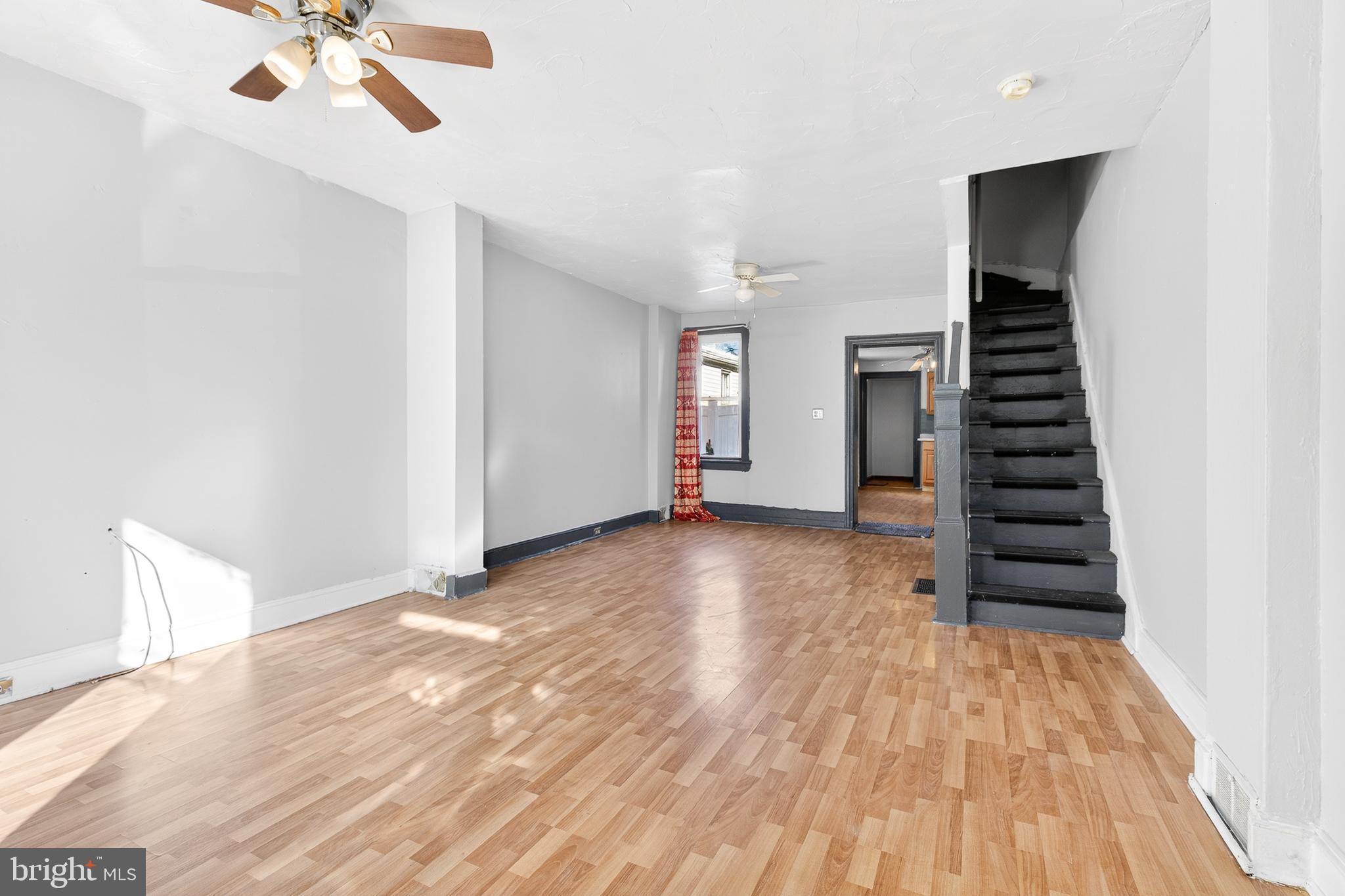 635 1st Street Lancaster, PA 17603 - Photo 4 of 32 wooden floor in an empty room with a window