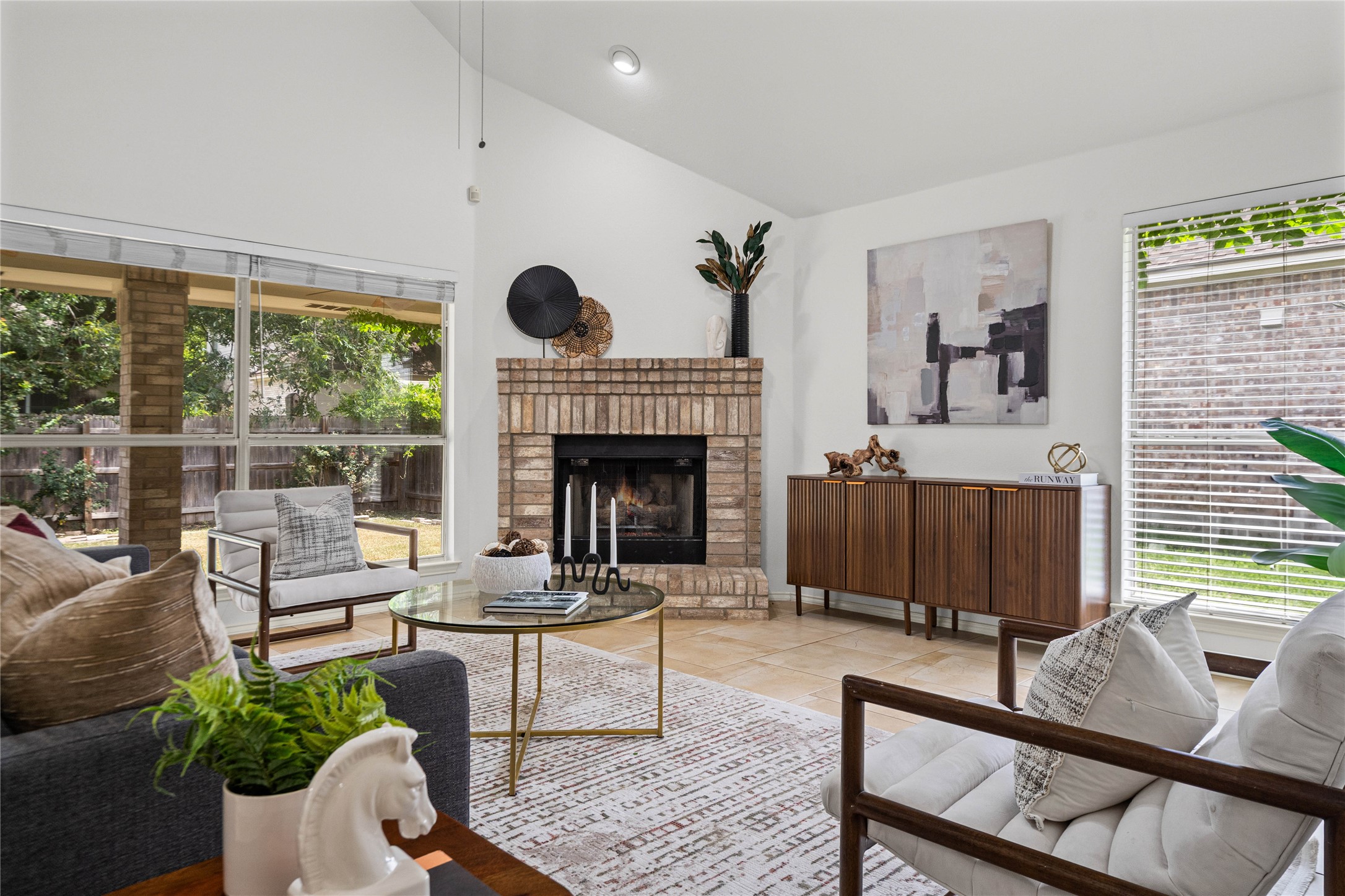 2920 Warwick Way Austin, TX 78748 - Photo 2 of 36 Open concept living with walls of windows, high ceilings, fireplace and fresh interior paint