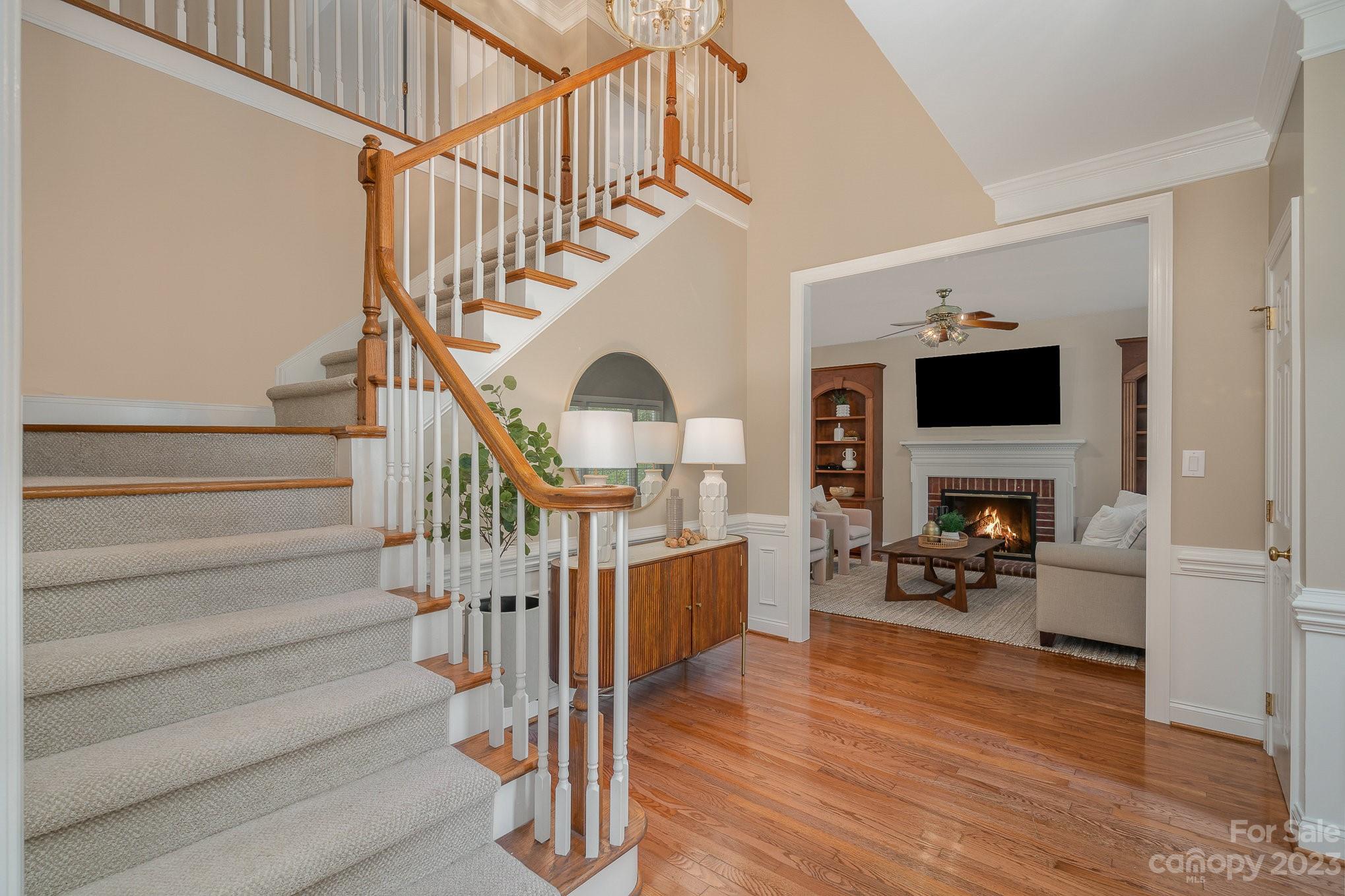 230 Sardis Pointe Road Matthews, NC 28105 - Photo 2 of 42 a view of entryway and hall with wooden floor