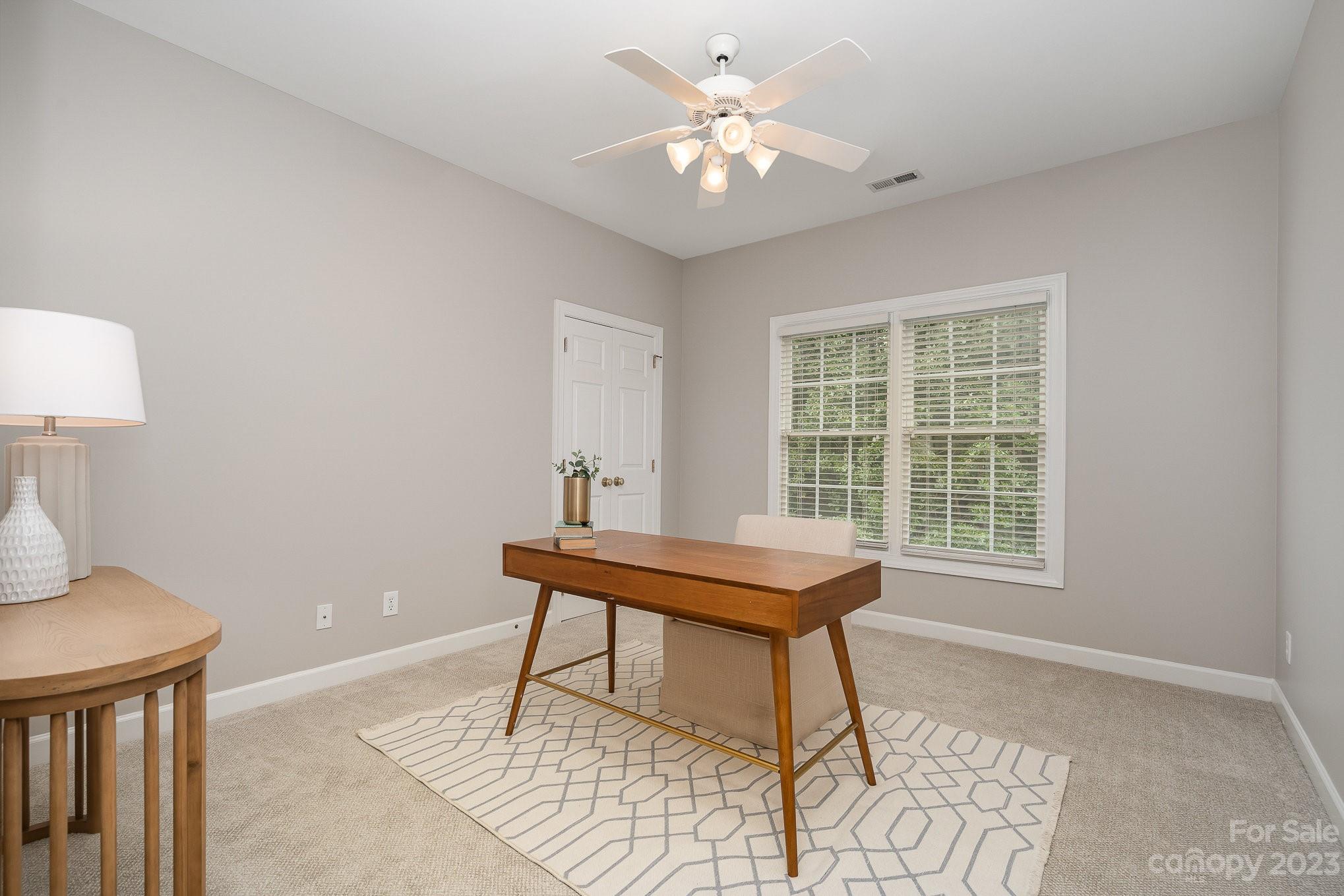230 Sardis Pointe Road Matthews, NC 28105 - Photo 27 of 42 a view of a workspace with furniture and a window