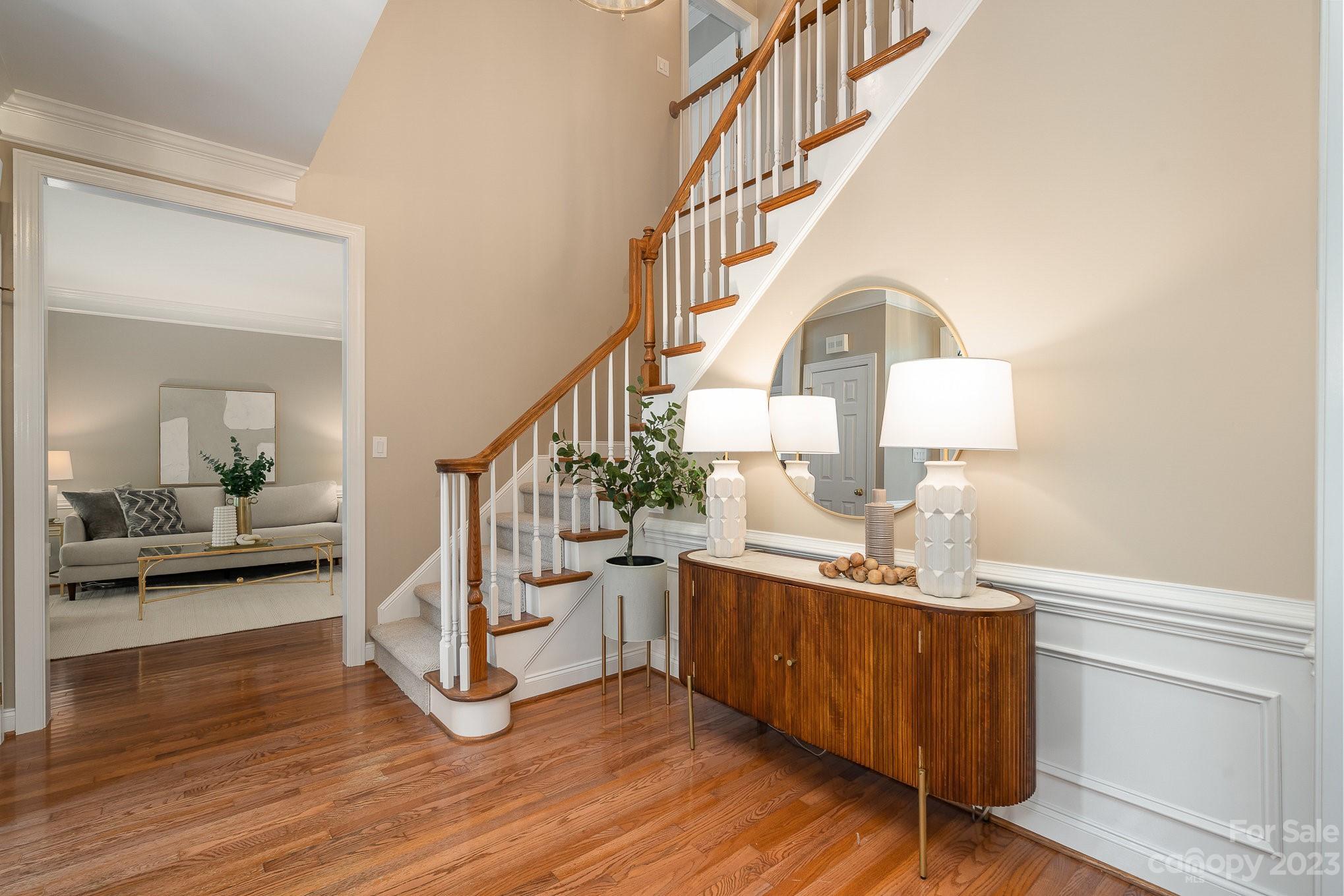 230 Sardis Pointe Road Matthews, NC 28105 - Photo 3 of 42 a view of entryway and hall with wooden floor