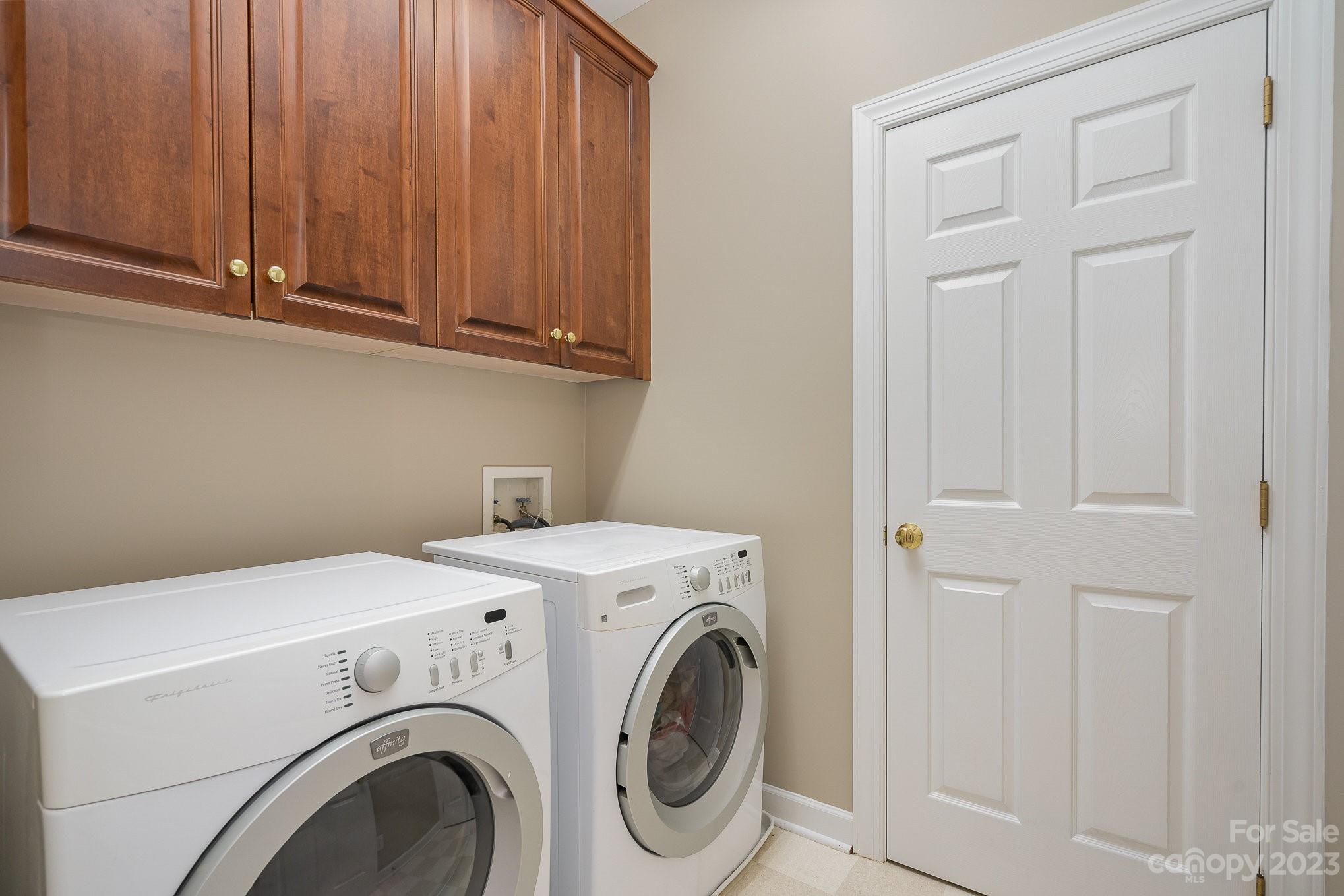230 Sardis Pointe Road Matthews, NC 28105 - Photo 32 of 42 a utility room with dryer and washer