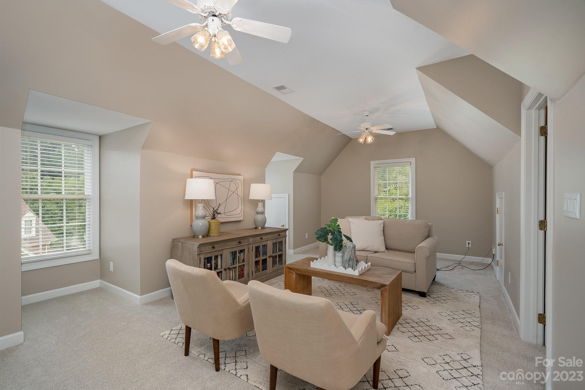 230 Sardis Pointe Road Matthews, NC 28105 - Photo 36 of 42 a living room with furniture and a window