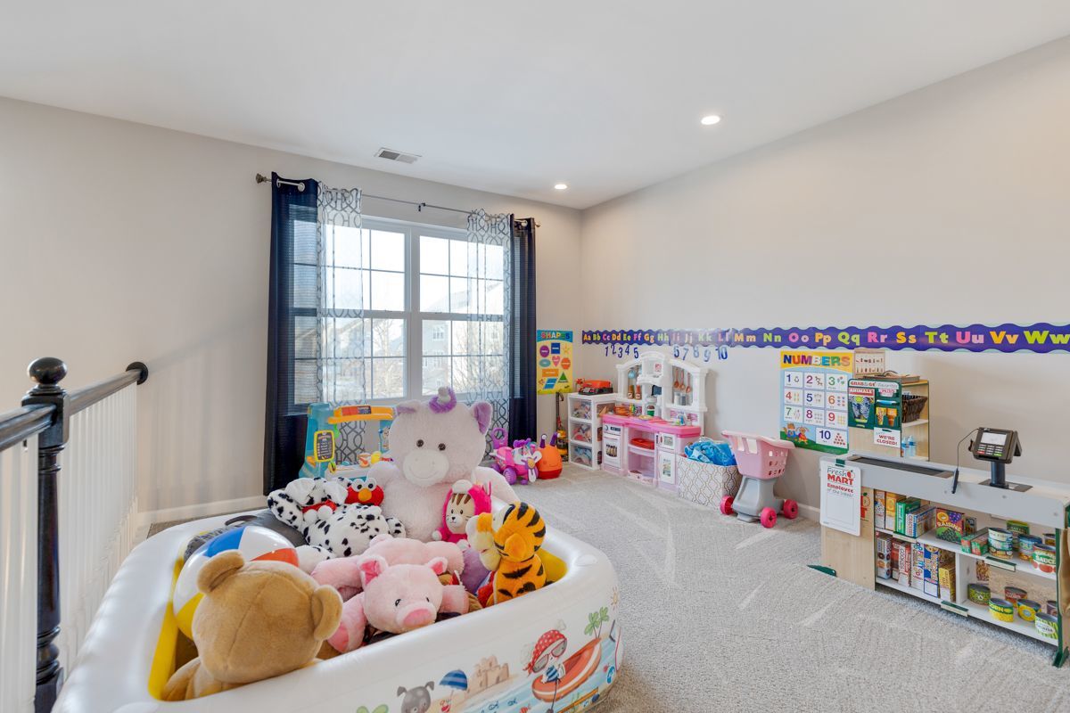3001 Wagon Road Elgin, IL 60124 - Photo 18 of 39 a children play room with toys