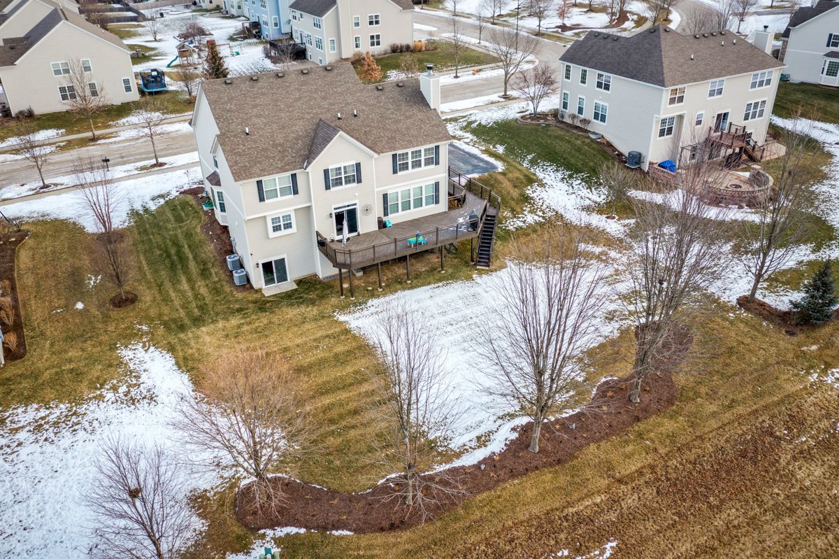 3001 Wagon Road Elgin, IL 60124 - Photo 29 of 39 a view of a house with a yard