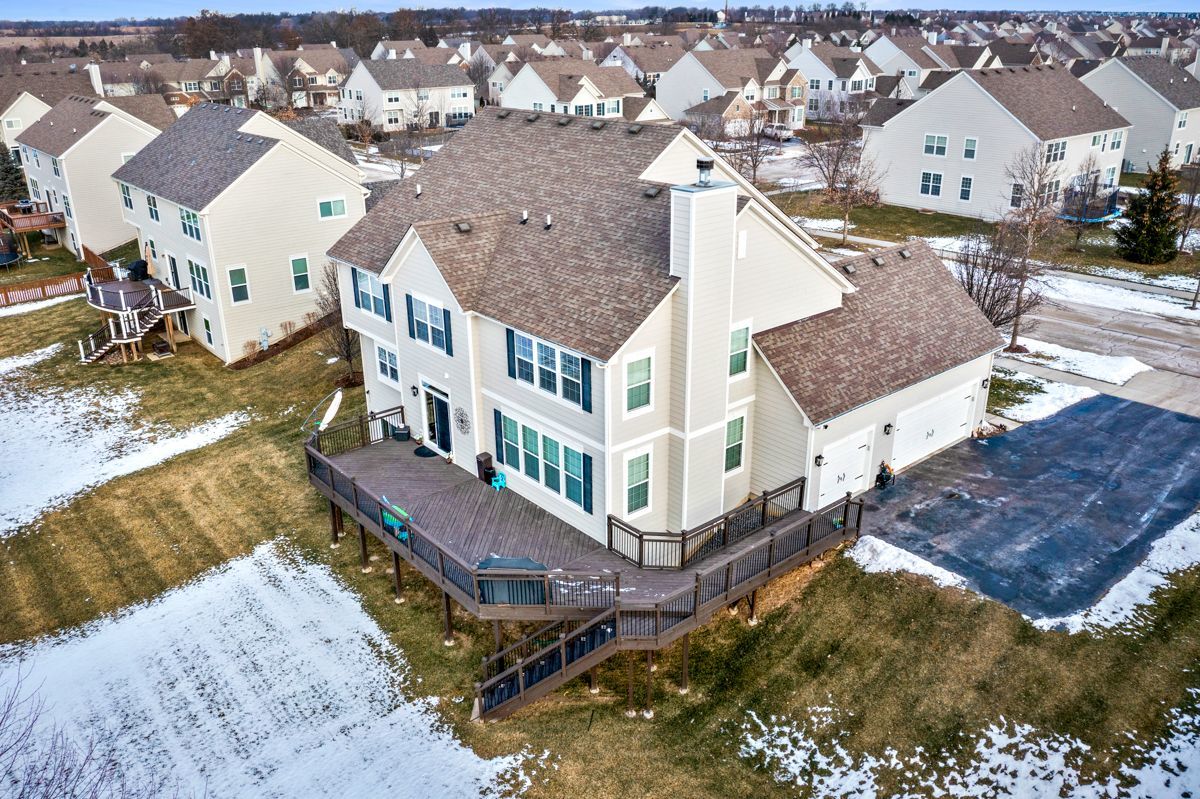 3001 Wagon Road Elgin, IL 60124 - Photo 30 of 39 an aerial view of residential houses with outdoor space