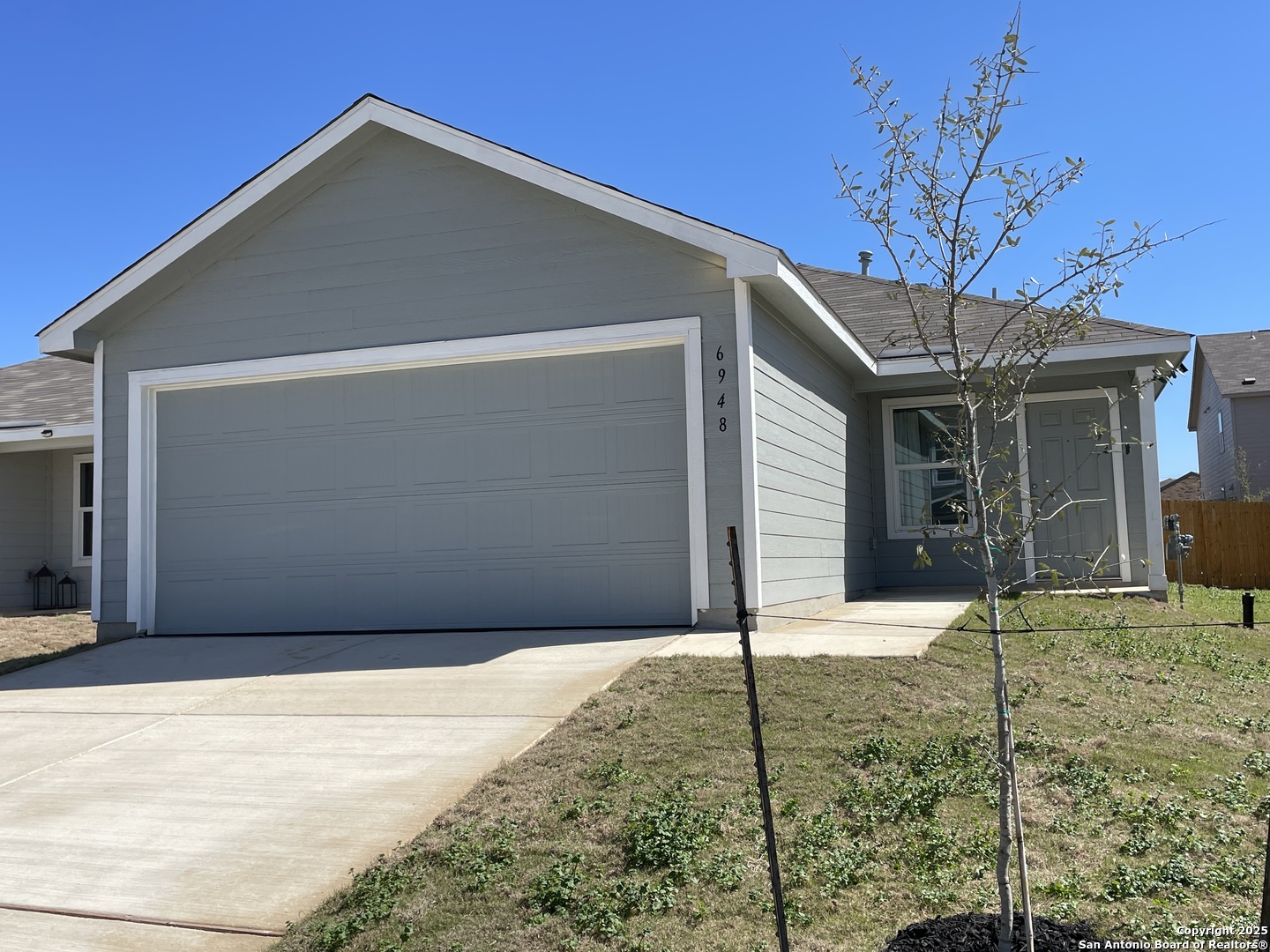 6948 Calcite Trail Elmendorf, TX 78112 - Photo 1 of 30 a backyard of a house