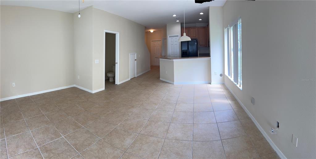 20474 Needletree Drive, Unit 20474 Tampa, FL 33647 - Photo 19 of 25 a view of a hallway to kitchen