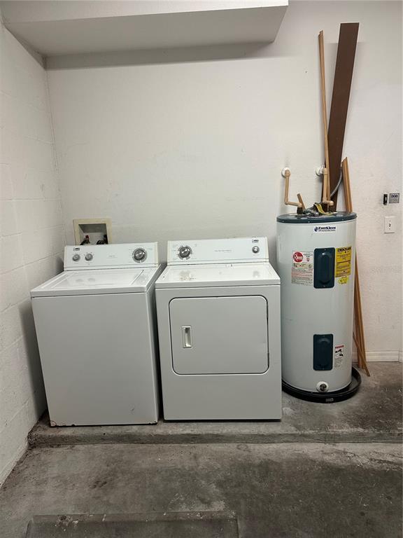20474 Needletree Drive, Unit 20474 Tampa, FL 33647 - Photo 6 of 25 a utility room with dryer and washer