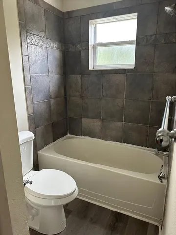 a bathroom with a sink and a bathtub