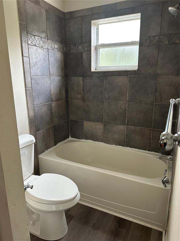 20474 Needletree Drive, Unit 20474 Tampa, FL 33647 - Photo 9 of 25 a bathroom with a sink and a bathtub