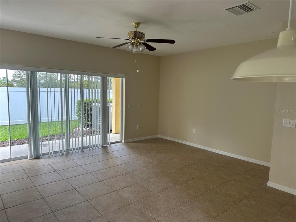 20474 Needletree Drive, Unit 20474 Tampa, FL 33647 - Photo 10 of 25 en empty room with windows