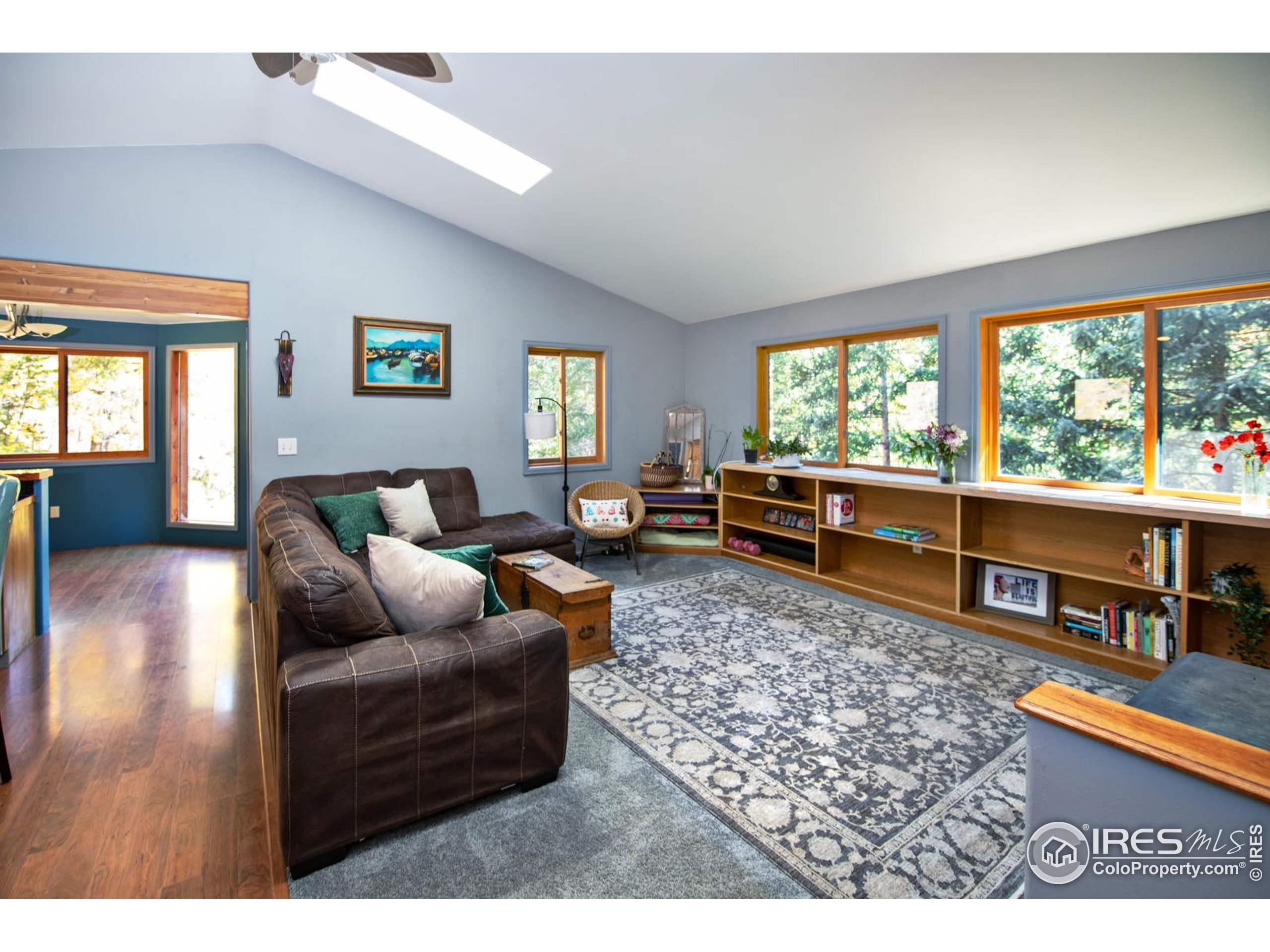 3727 Gamble Gulch Road Black Hawk, CO 80422 - Photo 18 of 30 a living room with furniture rug and a table