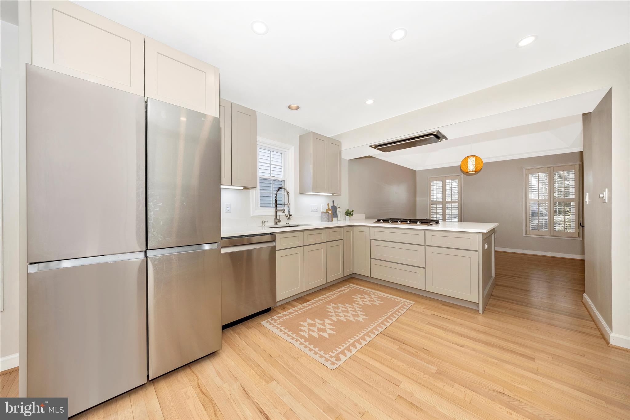 2478-5 Five Shillings Road Frederick, MD 21701 - Photo 25 of 77 a kitchen with a refrigerator and a sink