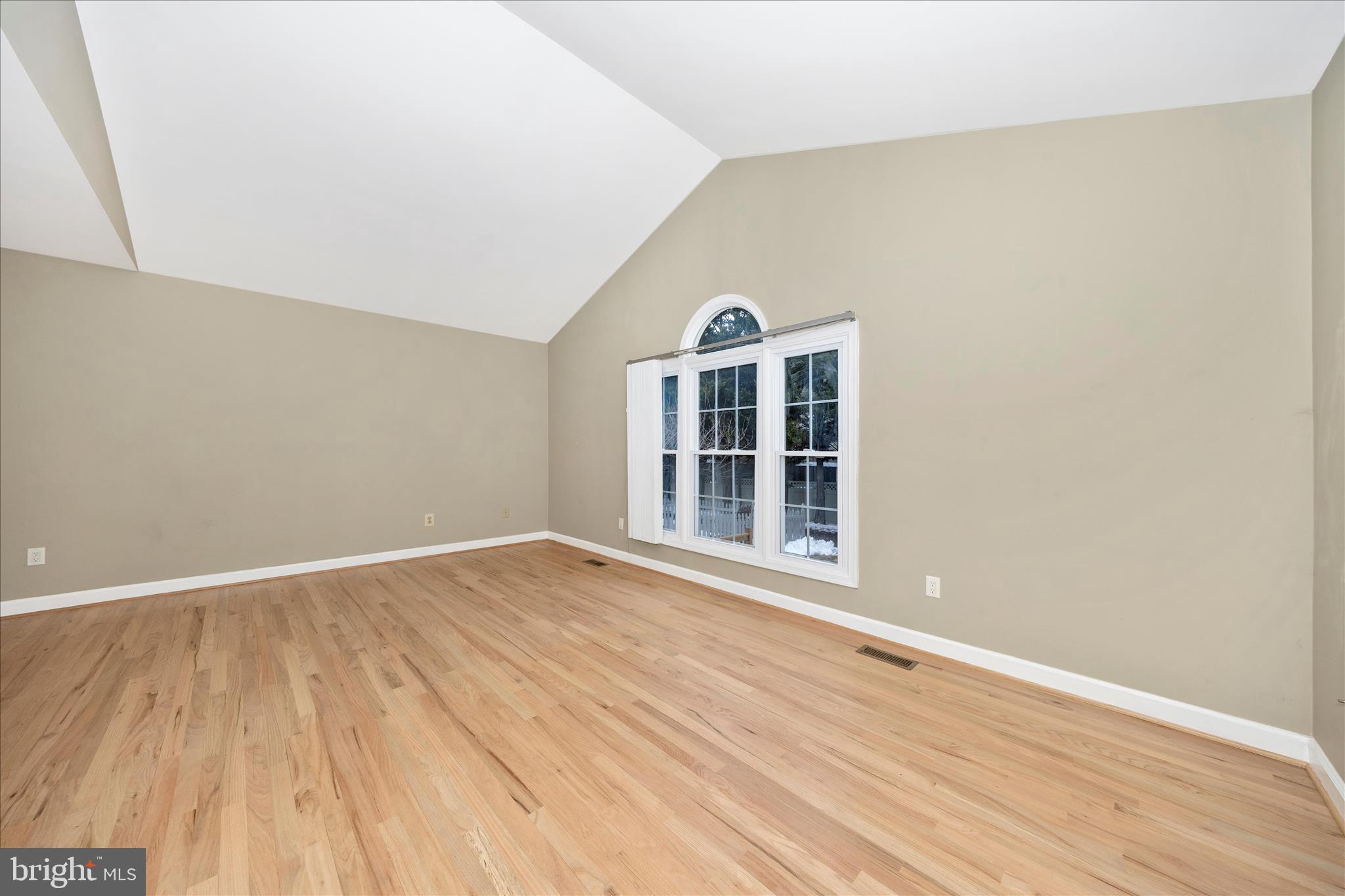 2478-5 Five Shillings Road Frederick, MD 21701 - Photo 31 of 77 an empty room with wooden floor and windows