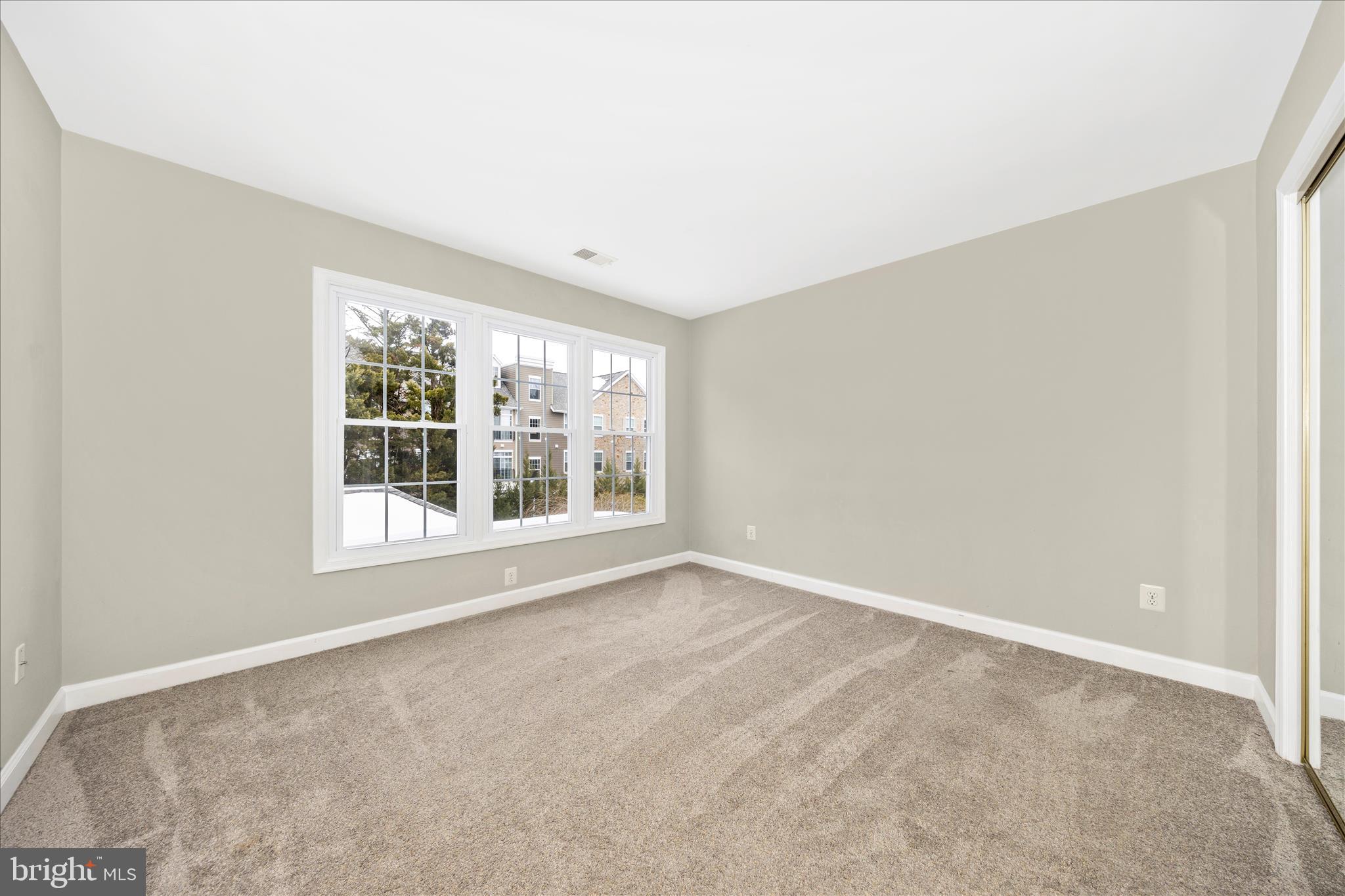 2478-5 Five Shillings Road Frederick, MD 21701 - Photo 40 of 77 a view of an empty room with a window