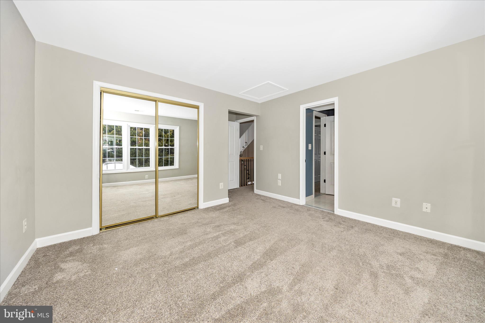 2478-5 Five Shillings Road Frederick, MD 21701 - Photo 41 of 77 an empty room with windows and closet