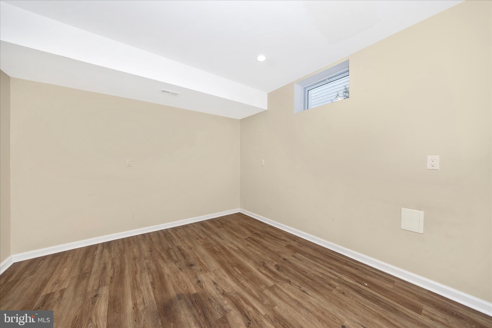 2478-5 Five Shillings Road Frederick, MD 21701 - Photo 53 of 77 a view of an empty room with wooden floor