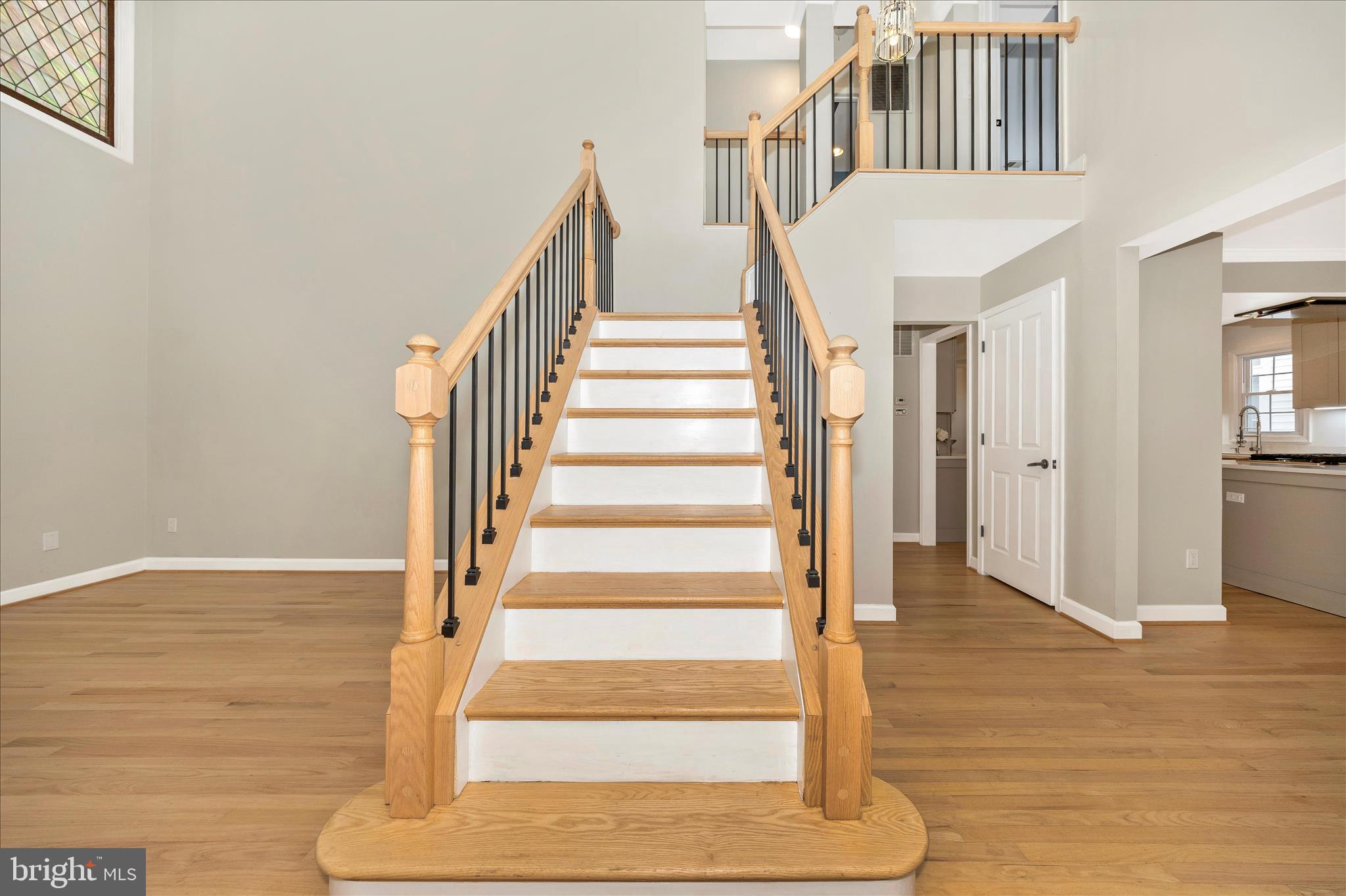 2478-5 Five Shillings Road Frederick, MD 21701 - Photo 6 of 77 a view of staircase with white walls and windows