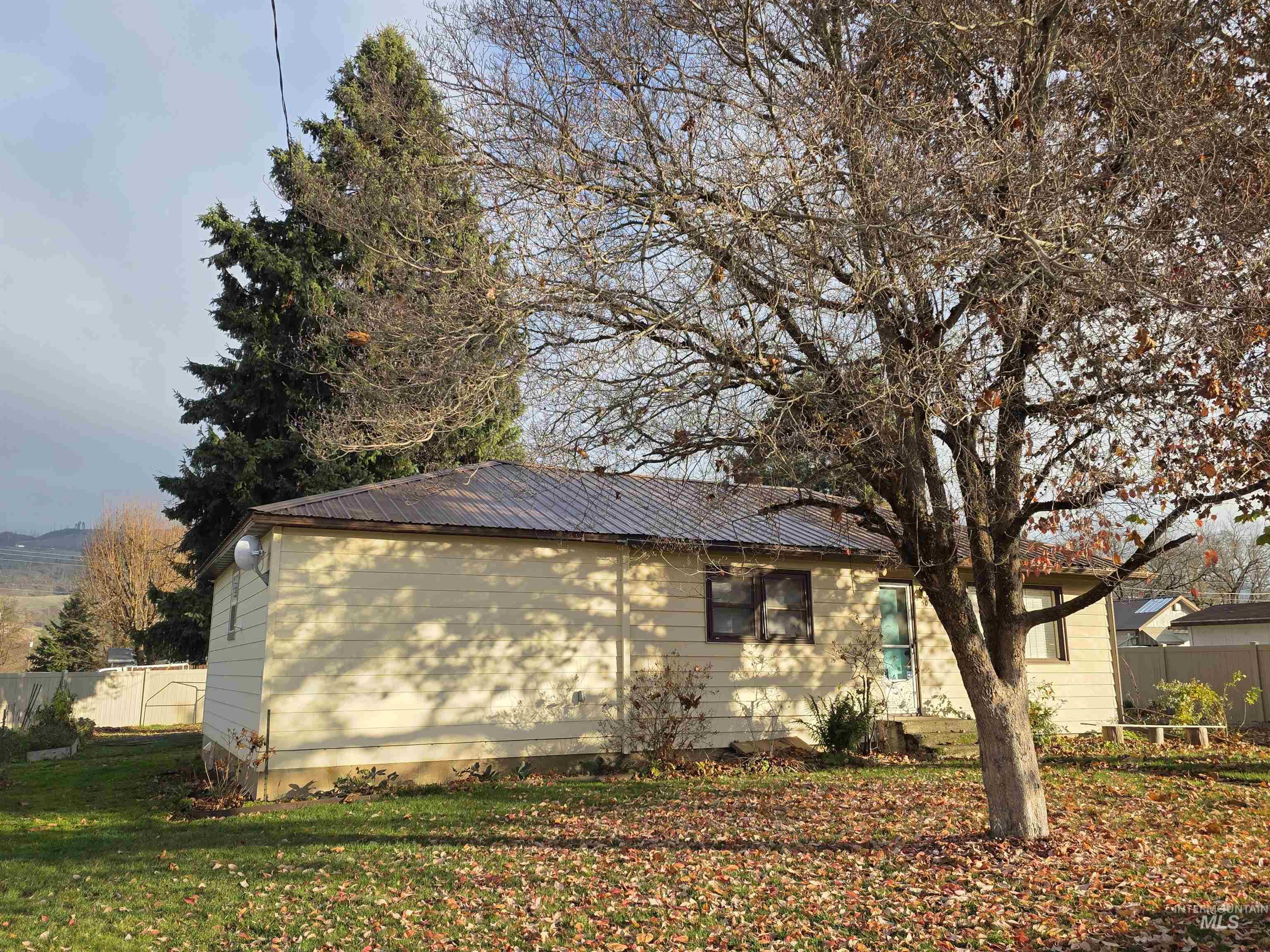 503 Oak Street Kamiah, ID 83536 - Photo 1 of 36 View of side of home with a metal roof