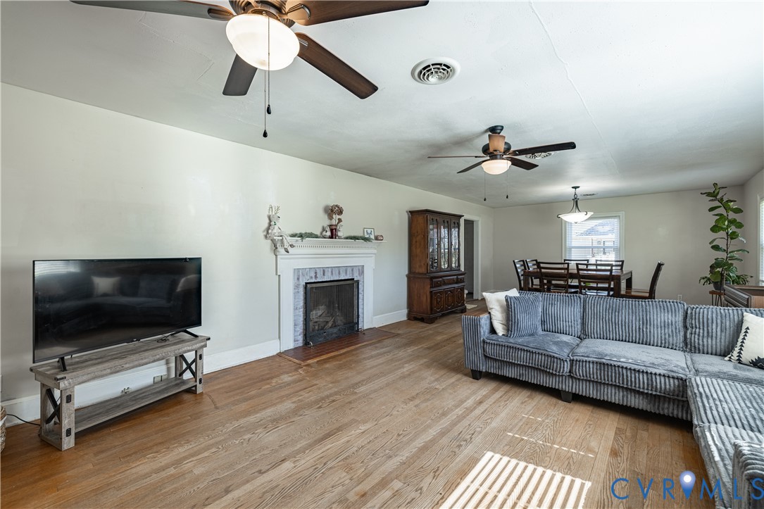 8710 North 5 Forks Road Amelia Court House, VA 23002 - Photo 12 of 59 Hardwood Floors, Wood Burning Fireplace & Ceiling